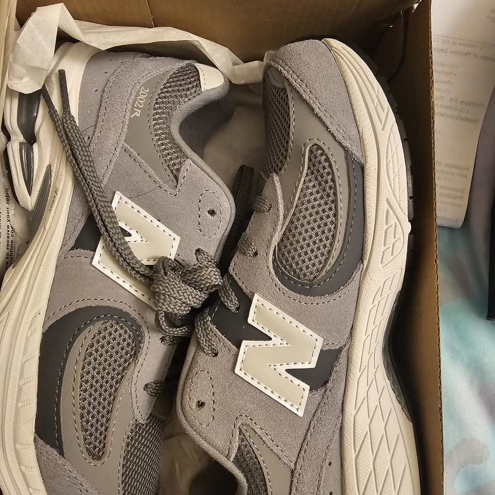 New Balance Kids Sneakers in Gray and White